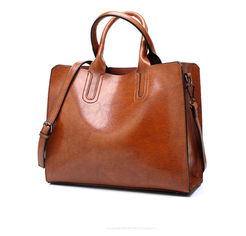 Bolsa feminina clássica casual e vintage em couro totalmente ecológico